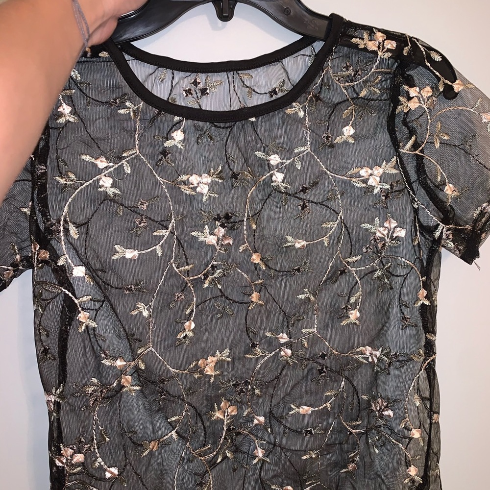 Mesh black top with flower details